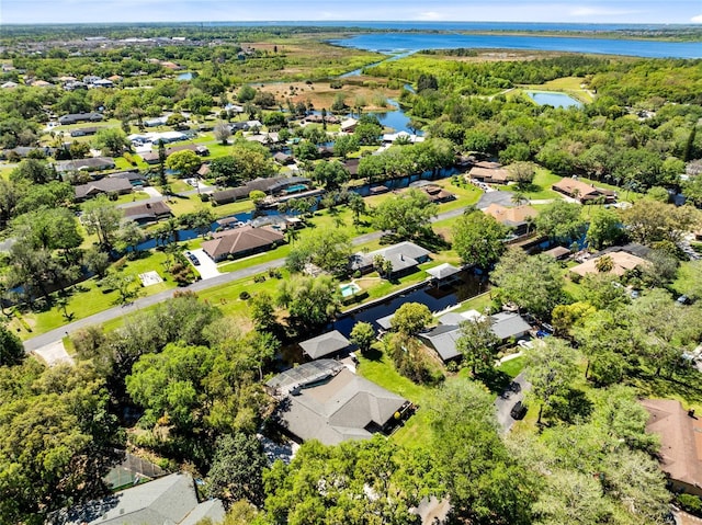 5370 Whispering Pine Cir, Saint Cloud, FL 34771 - aerial view of residential area featuring a nearby body of water