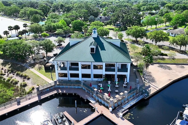 5370 Whispering Pine Cir, Saint Cloud, FL 34771 - back of house featuring a water view and metal roof