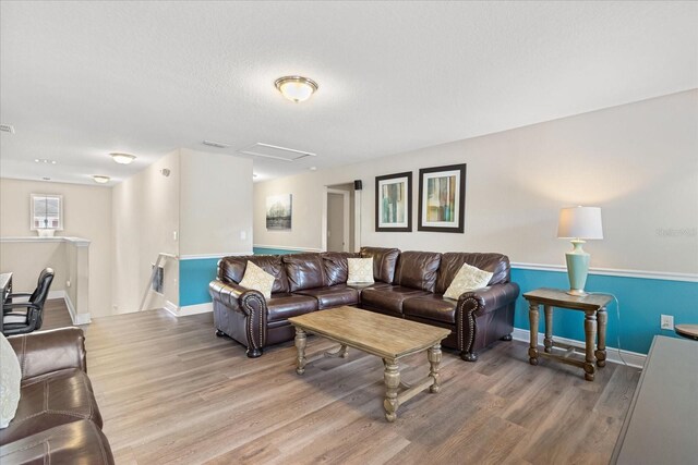 5353 Oakbourne Ave, Davenport, FL 33837 - living area featuring light wood-type flooring and baseboards