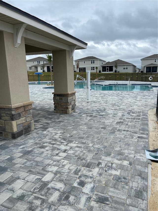 community pool featuring a patio