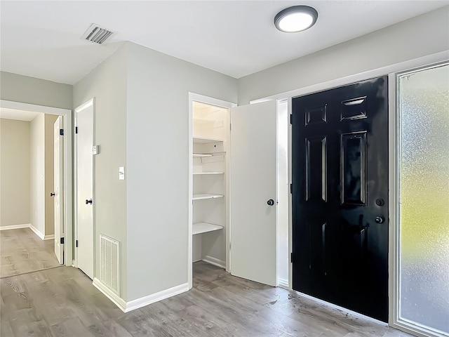43 Lake Court Loop, Ocala, FL 34472 - foyer with wood finished floors and baseboards