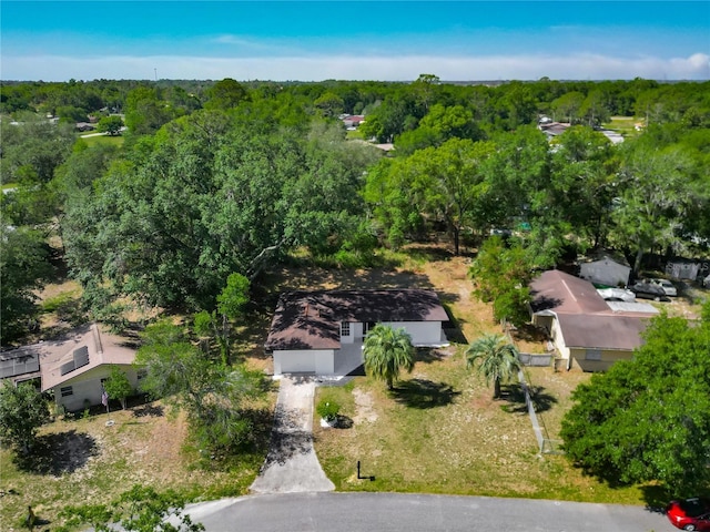 43 Lake Court Loop, Ocala, FL 34472 - aerial overview of property's location featuring a heavily wooded area