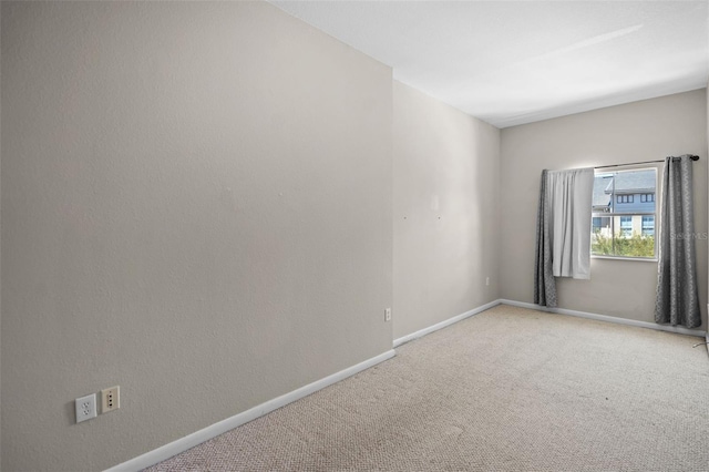 2411 W Horatio St Unit 537, Tampa, FL 33609 - empty room featuring carpet flooring and baseboards
