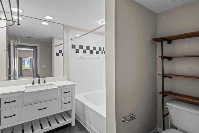 2411 W Horatio St Unit 537, Tampa, FL 33609 - bathroom with vanity, bathtub / shower combination, toilet, recessed lighting, and baseboards