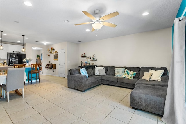 281 Primrose Dr, Davenport, FL 33837 - living room with recessed lighting, a ceiling fan, and light tile patterned floors
