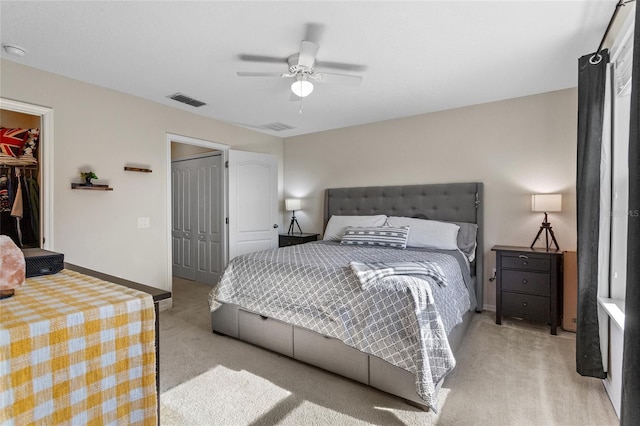 281 Primrose Dr, Davenport, FL 33837 - bedroom featuring light carpet, baseboards, a ceiling fan, a walk in closet, and a closet