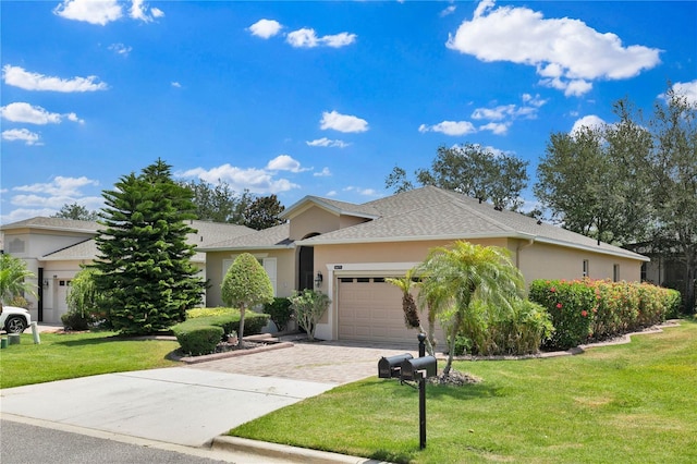 3677 Serena Ln, Clermont, FL 34711 - single story home with an attached garage, driveway, a front lawn, and stucco siding