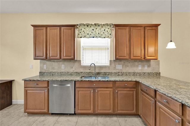 3677 Serena Ln, Clermont, FL 34711 - kitchen with a sink, backsplash, light stone counters, and brown cabinetry