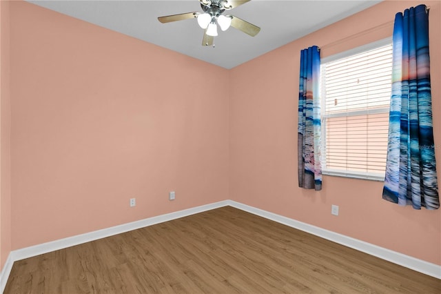3677 Serena Ln, Clermont, FL 34711 - unfurnished room featuring wood finished floors, baseboards, and ceiling fan