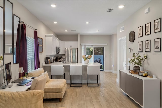 146 E 15th St, Apopka, FL 32703 - living area with recessed lighting and baseboards