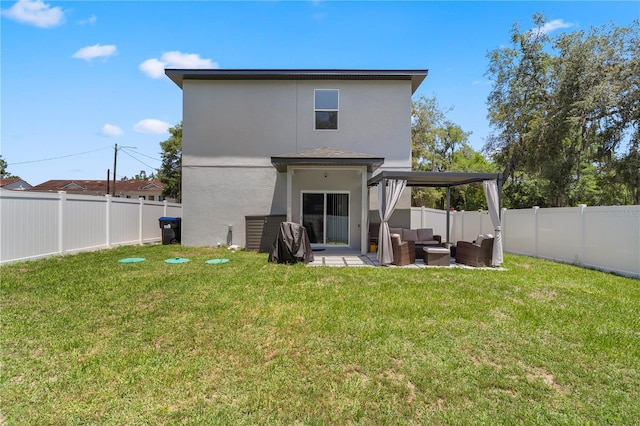 146 E 15th St, Apopka, FL 32703 - rear view of property with an outdoor hangout area, stucco siding, and a patio