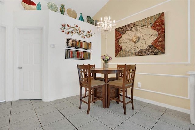 204 Bay Meadow Dr, Kissimmee, FL 34746 - dining area with a chandelier, light tile patterned floors, and baseboards