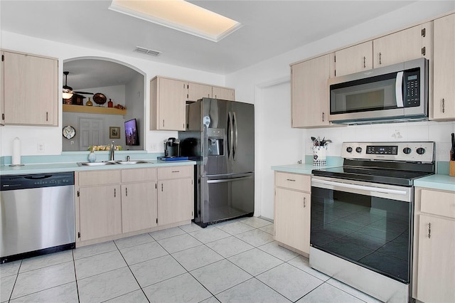 204 Bay Meadow Dr, Kissimmee, FL 34746 - kitchen featuring appliances with stainless steel finishes, a sink, light countertops, and ceiling fan