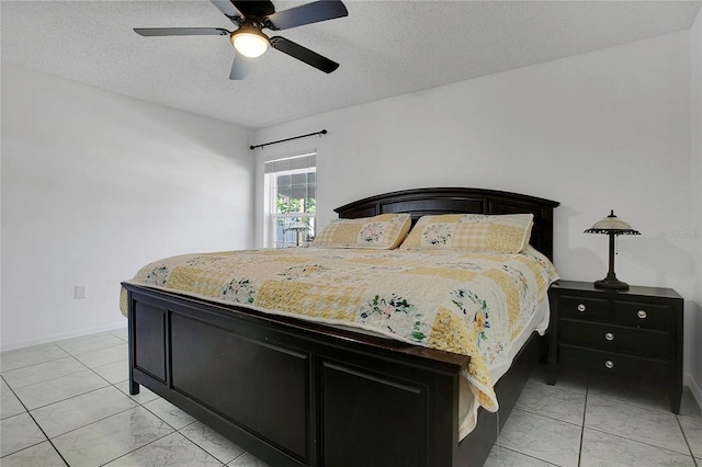 204 Bay Meadow Dr, Kissimmee, FL 34746 - bedroom featuring a textured ceiling, a ceiling fan, and baseboards