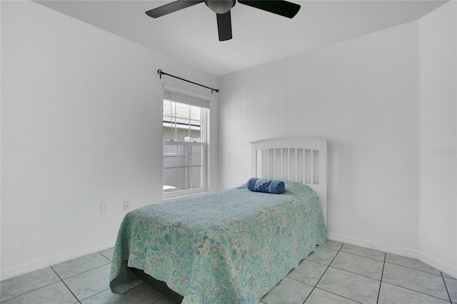 204 Bay Meadow Dr, Kissimmee, FL 34746 - tiled bedroom featuring baseboards and ceiling fan
