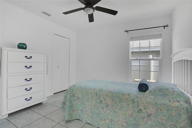 204 Bay Meadow Dr, Kissimmee, FL 34746 - bedroom featuring light tile patterned floors and a ceiling fan
