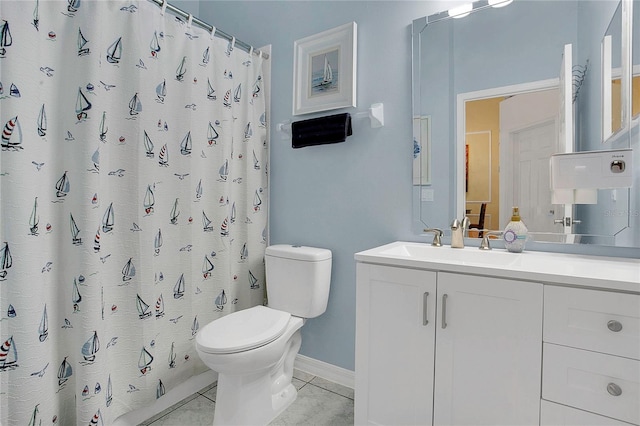204 Bay Meadow Dr, Kissimmee, FL 34746 - full bath with toilet, vanity, tile patterned flooring, a shower with curtain, and baseboards