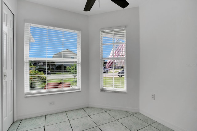 204 Bay Meadow Dr, Kissimmee, FL 34746 - empty room with a ceiling fan, baseboards, and light tile patterned floors