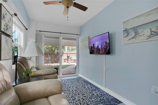 204 Bay Meadow Dr, Kissimmee, FL 34746 - living area with plenty of natural light, ceiling fan, and baseboards