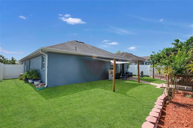 204 Bay Meadow Dr, Kissimmee, FL 34746 - back of house featuring stucco siding and a patio