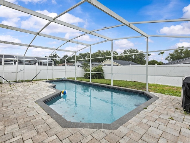 1112 Winding Water Way, Clermont, FL 34714 - view of swimming pool with a fenced backyard, a patio, and a lanai