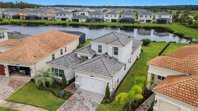 aerial perspective of suburban area featuring a large body of water