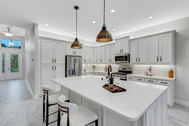 kitchen featuring stainless steel appliances, light marble finish flooring, decorative backsplash, baseboards, and recessed lighting