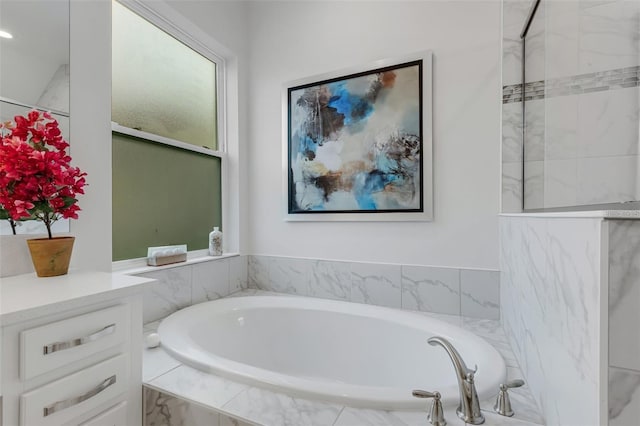 bathroom with a garden tub
