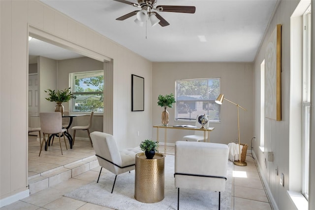 614 Plum Ln, Altamonte Springs, FL 32701 - living area featuring a ceiling fan and light tile patterned flooring