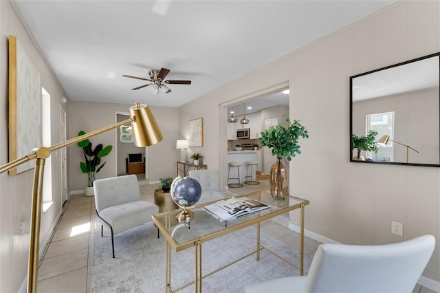 614 Plum Ln, Altamonte Springs, FL 32701 - tiled home office featuring a ceiling fan and baseboards