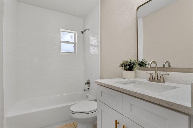 614 Plum Ln, Altamonte Springs, FL 32701 - bathroom featuring toilet, bathtub / shower combination, vanity, and a textured wall