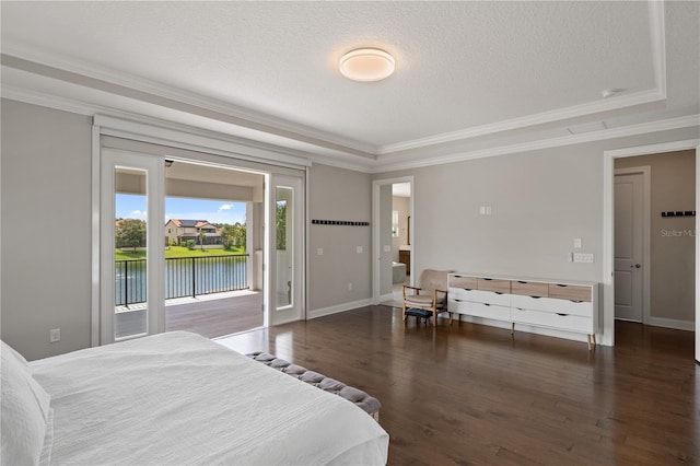 10529 Royal Cypress Way, Orlando, FL 32836 - bedroom featuring access to exterior, crown molding, wood finished floors, a textured ceiling, and a water view