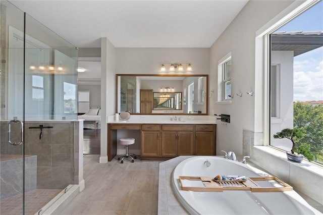 10529 Royal Cypress Way, Orlando, FL 32836 - full bath featuring a bath, vanity, and a shower stall
