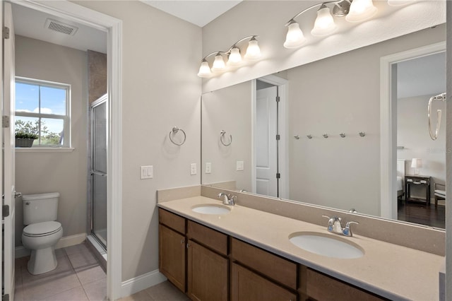 10529 Royal Cypress Way, Orlando, FL 32836 - full bath with double vanity, tile patterned floors, and a stall shower