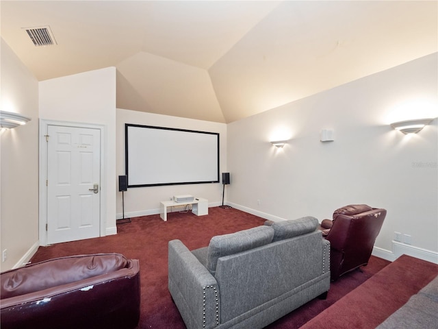 6161 Blakeford Dr, Windermere, FL 34786 - carpeted home theater room with vaulted ceiling and baseboards