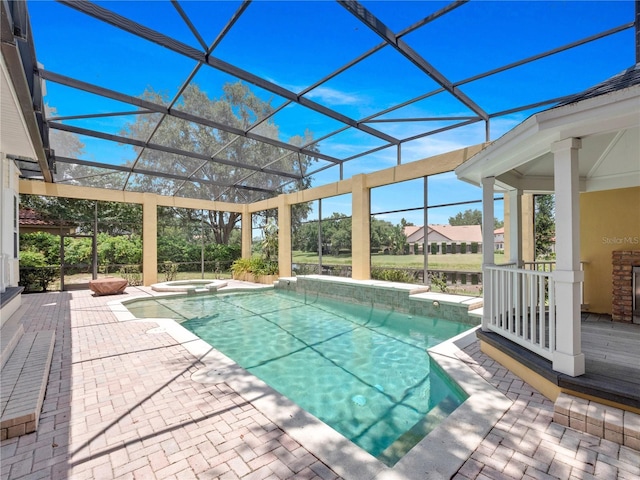 6161 Blakeford Dr, Windermere, FL 34786 - view of pool featuring a patio, a pool with connected hot tub, and glass enclosure