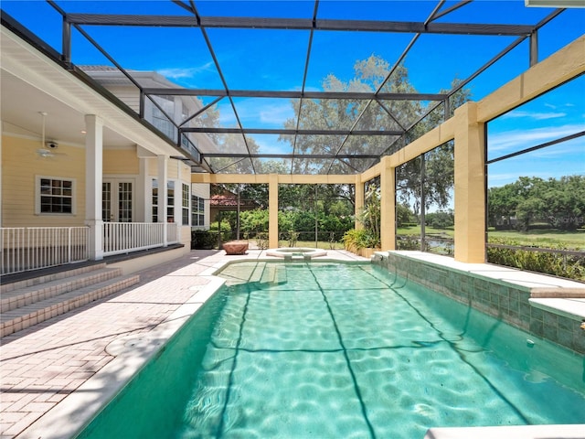 6161 Blakeford Dr, Windermere, FL 34786 - view of pool with glass enclosure, a pool with connected hot tub, and a patio