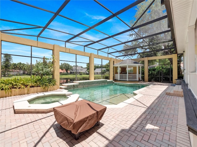 6161 Blakeford Dr, Windermere, FL 34786 - view of swimming pool featuring a gazebo, a patio area, glass enclosure, and a pool with connected hot tub