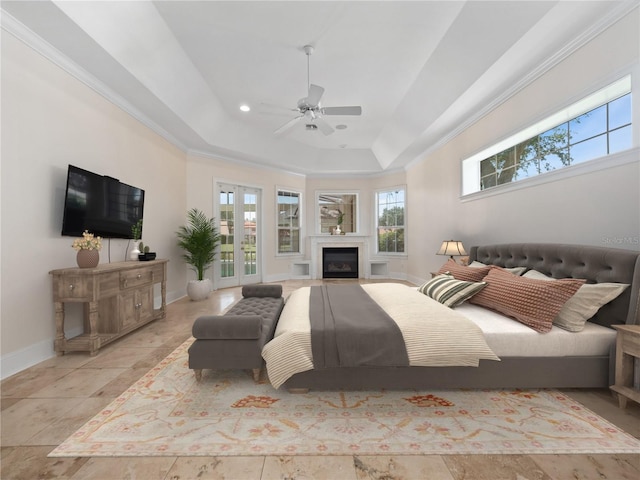 6161 Blakeford Dr, Windermere, FL 34786 - bedroom with a tray ceiling, a fireplace, recessed lighting, and ceiling fan