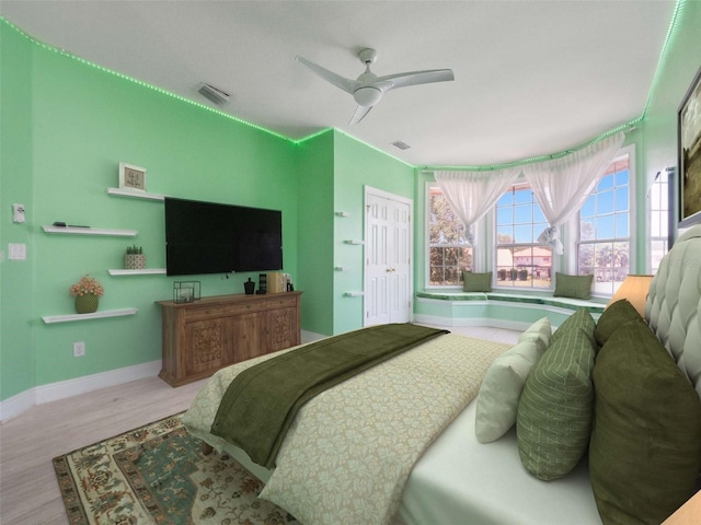 6161 Blakeford Dr, Windermere, FL 34786 - bedroom with wood finished floors and a ceiling fan