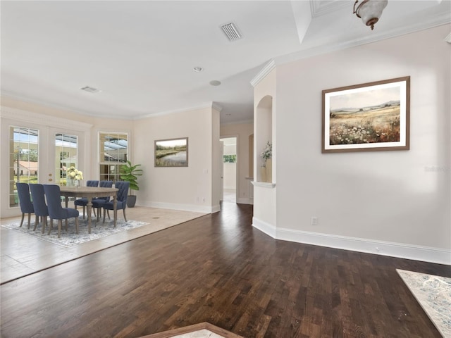6161 Blakeford Dr, Windermere, FL 34786 - dining space featuring wood finished floors, crown molding, and french doors