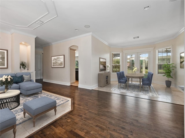 6161 Blakeford Dr, Windermere, FL 34786 - living room with arched walkways, wood finished floors, and crown molding