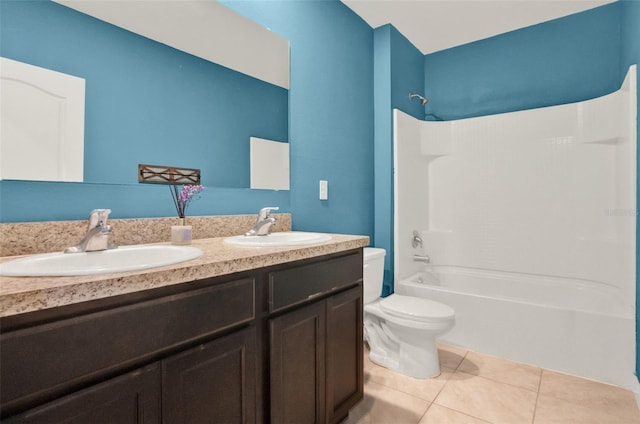 5967 Churchill Square Way, Groveland, FL 34736 - bathroom featuring toilet, double vanity, shower / tub combination, and tile patterned flooring