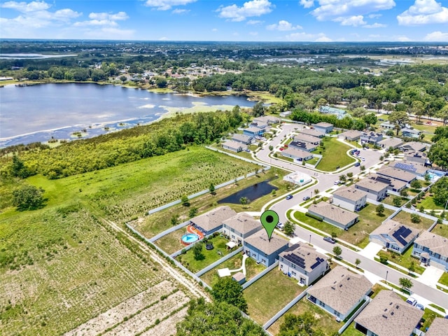 5967 Churchill Square Way, Groveland, FL 34736 - aerial perspective of suburban area with a large body of water