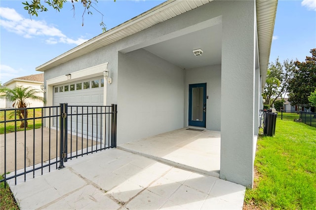 2125 Shackley Pl, Apopka, FL 32703 - view of exterior entry with stucco siding and an attached garage