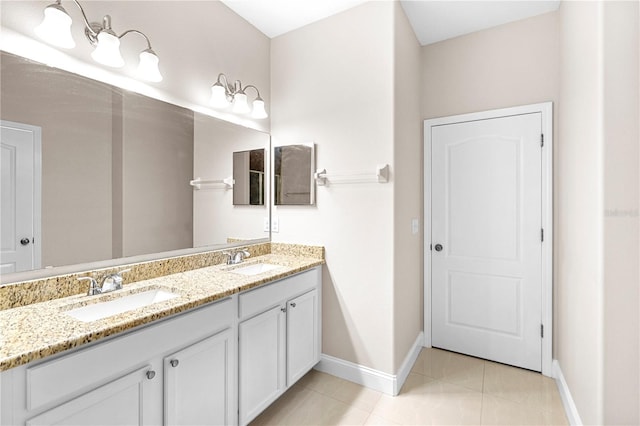 2125 Shackley Pl, Apopka, FL 32703 - bathroom with double vanity and tile patterned floors