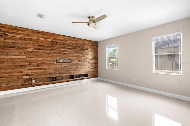 2125 Shackley Pl, Apopka, FL 32703 - spare room with ceiling fan and wooden walls
