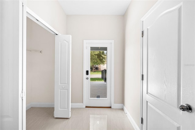2125 Shackley Pl, Apopka, FL 32703 - entrance foyer with baseboards and light tile patterned floors