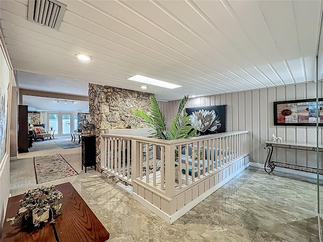 103 Red Cedar Dr, Longwood, FL 32779 - hall with french doors, marble finish floors, and an upstairs landing