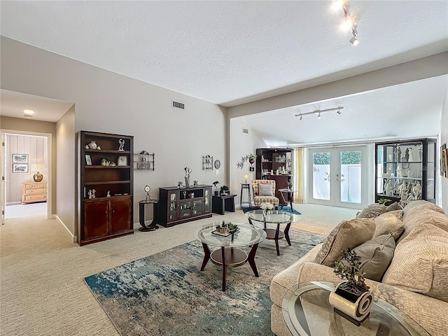 103 Red Cedar Dr, Longwood, FL 32779 - living area featuring rail lighting, french doors, and carpet floors